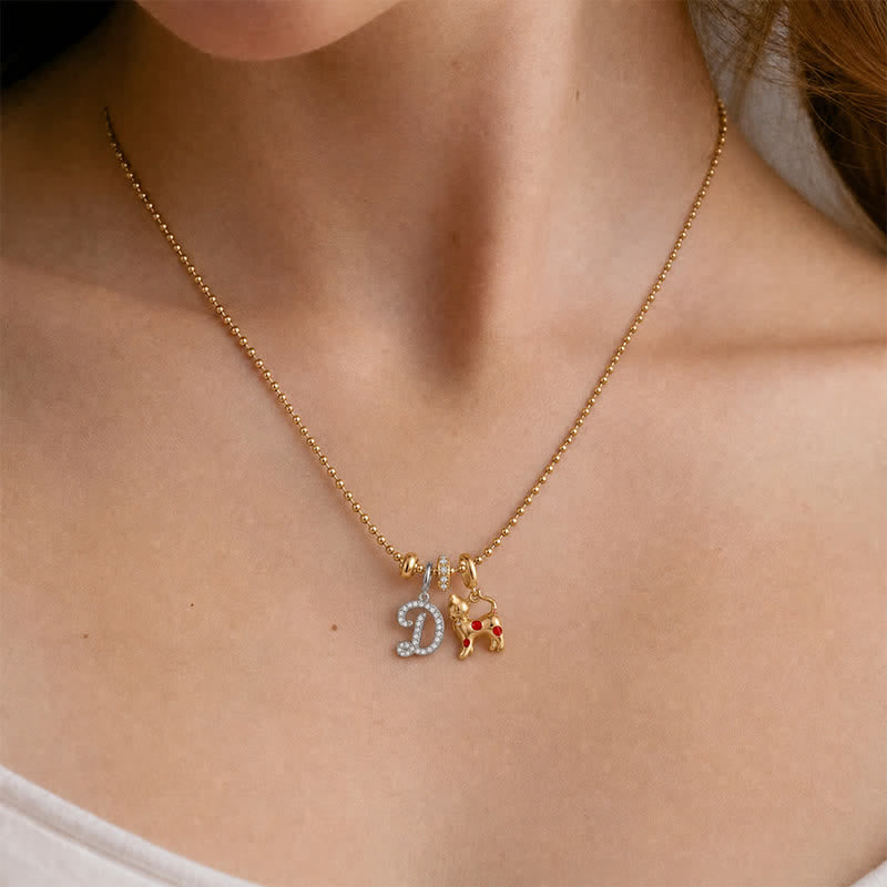 TaleClasp Playful Red Dot Cat Gold Tone Charm Pendant - image 1